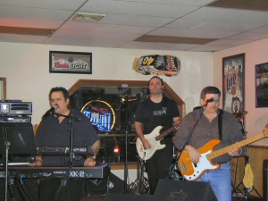Larry's the one hiding behind Dave!
